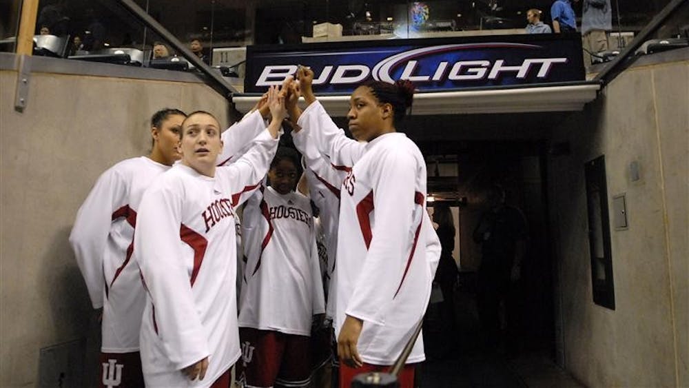 Members of the IU basketball team huddle up before taking the court for a game against Purdue during the second round of the Big Ten Tournament on March 6 at Conseco Fieldhouse in Indianapolis.