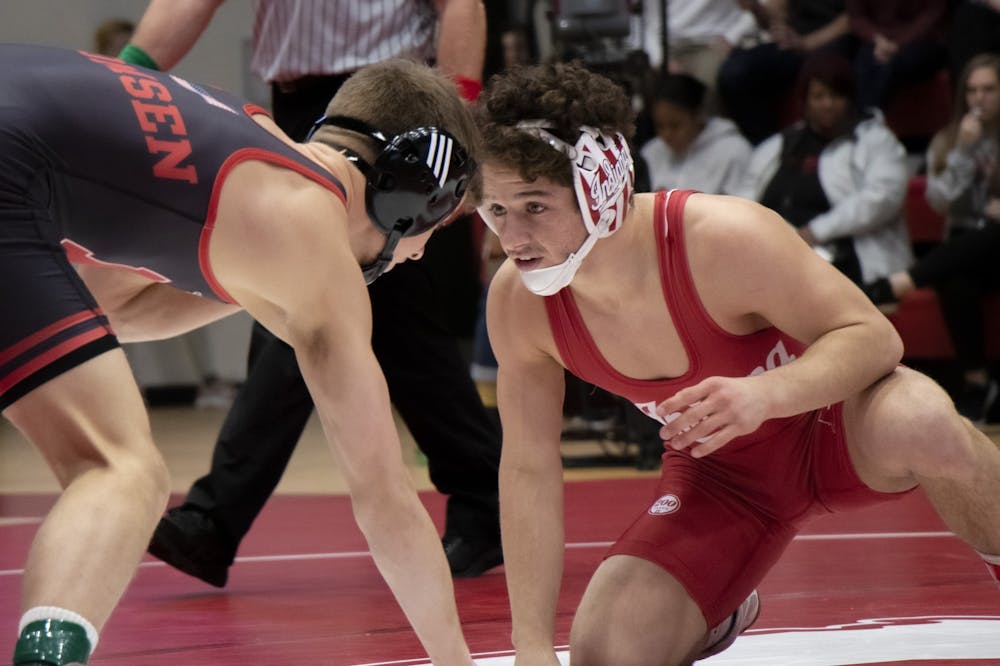 <p>Redshirt junior Liam Cronin wrestles Nebraska redshirt freshman Alex Thomsen Feb. 9 at Wilkinson Hall. IU will compete against the University of Tennessee at Chattanooga at 7 p.m. Friday on the road.</p>