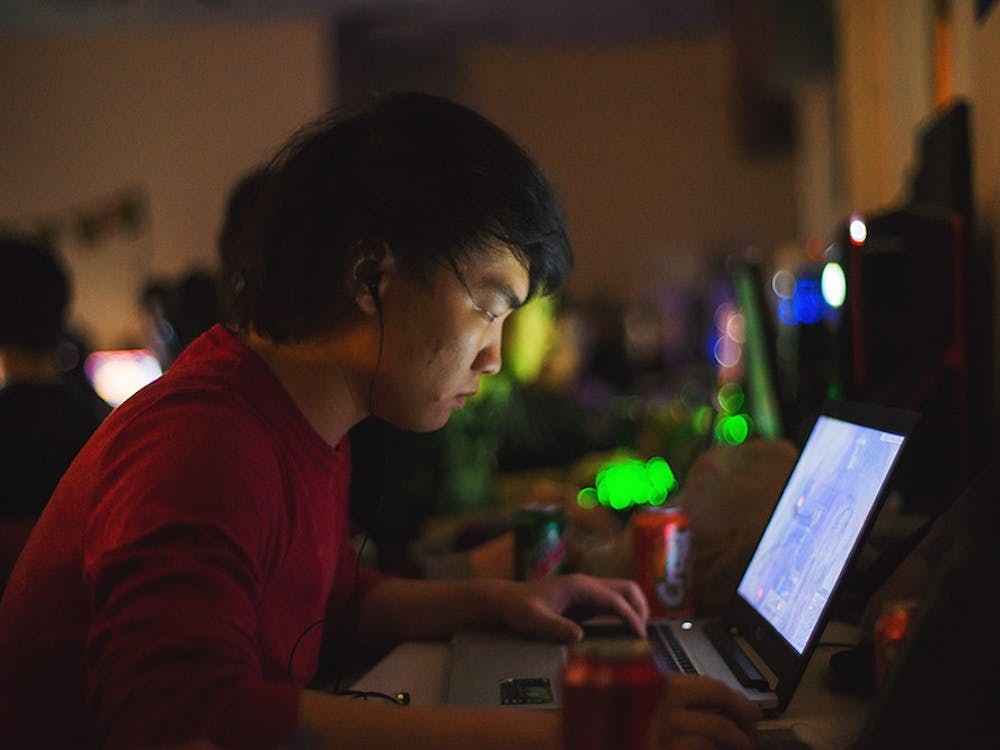 Ngai Lung Wan from team Indiana BlackArrow concentrates on gaming. His team was playing the first round of the "League of Legends" tournament at the LAN WAR gaming event at Briscoe on Saturday night.