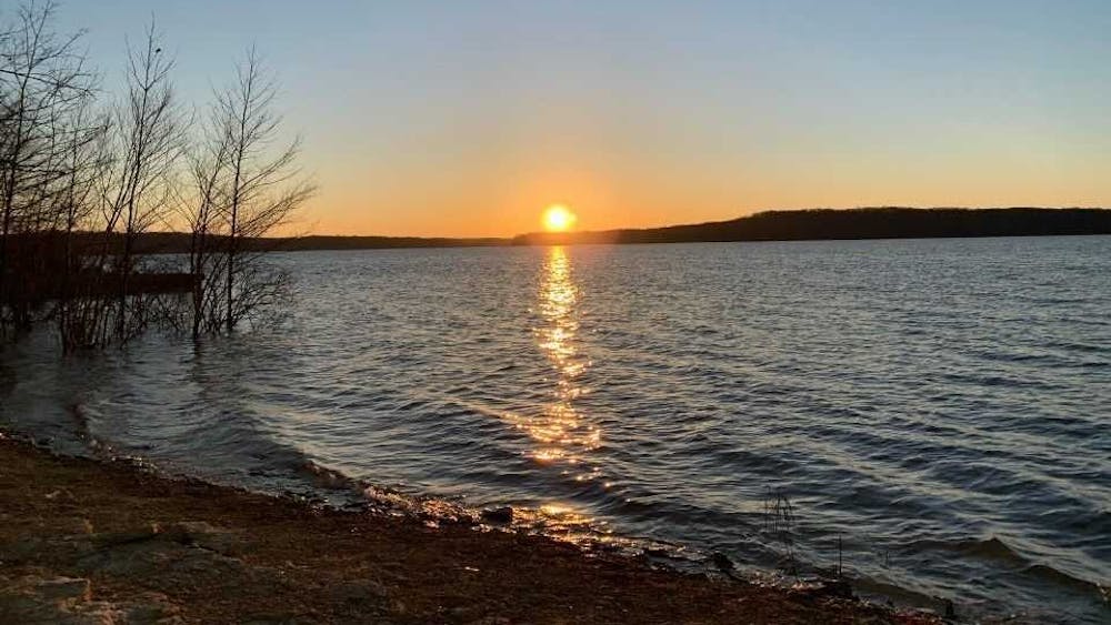 The sun rises March 30 on Lake Monroe.