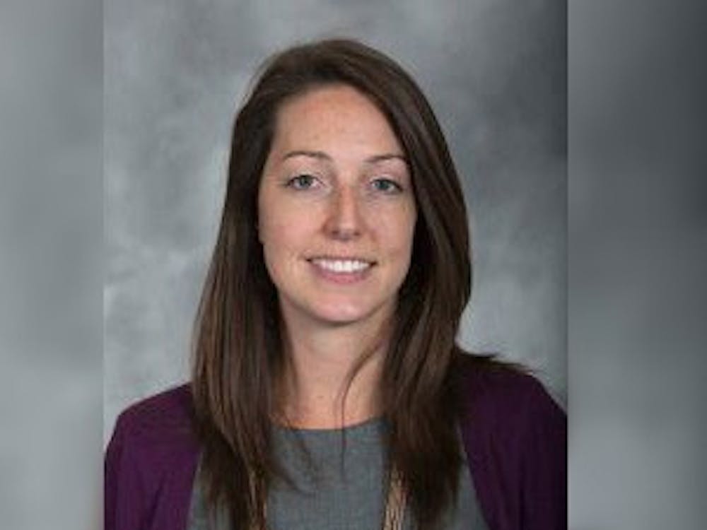 Dr. Caitlin Bernard, an IU Health OB-GYN and assistant professor at the IU School of Medicine, smiles for a portrait. The Indiana Medical Licensing Board found Bernard, an IU Health OB-GYN who provided abortion care to a 10-year-old girl from Ohio in July 2022, violated state and federal privacy laws in a hearing Thursday.