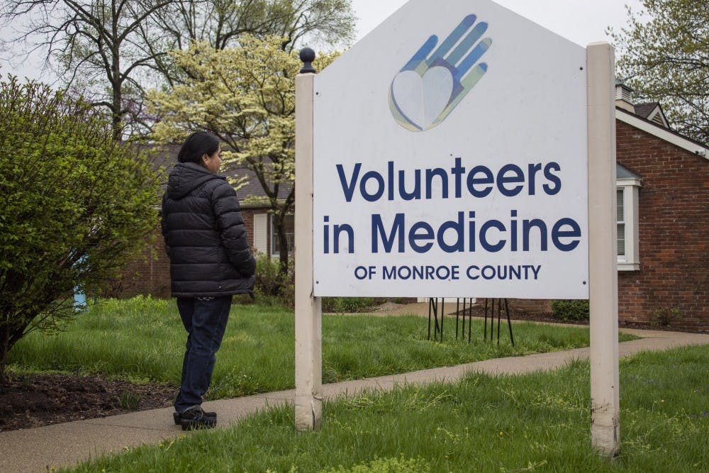 <p>Maria López walks into the Volunteers in Medicine of Monroe County Clinic on April 19. López took her son to the clinic about two years after moving to Bloomington from Mexico City, and the clinic referred him to Riley Hospital for Children at IU Health in Indianapolis where he was diagnosed with Rocky Mountain Spotted Fever.</p>