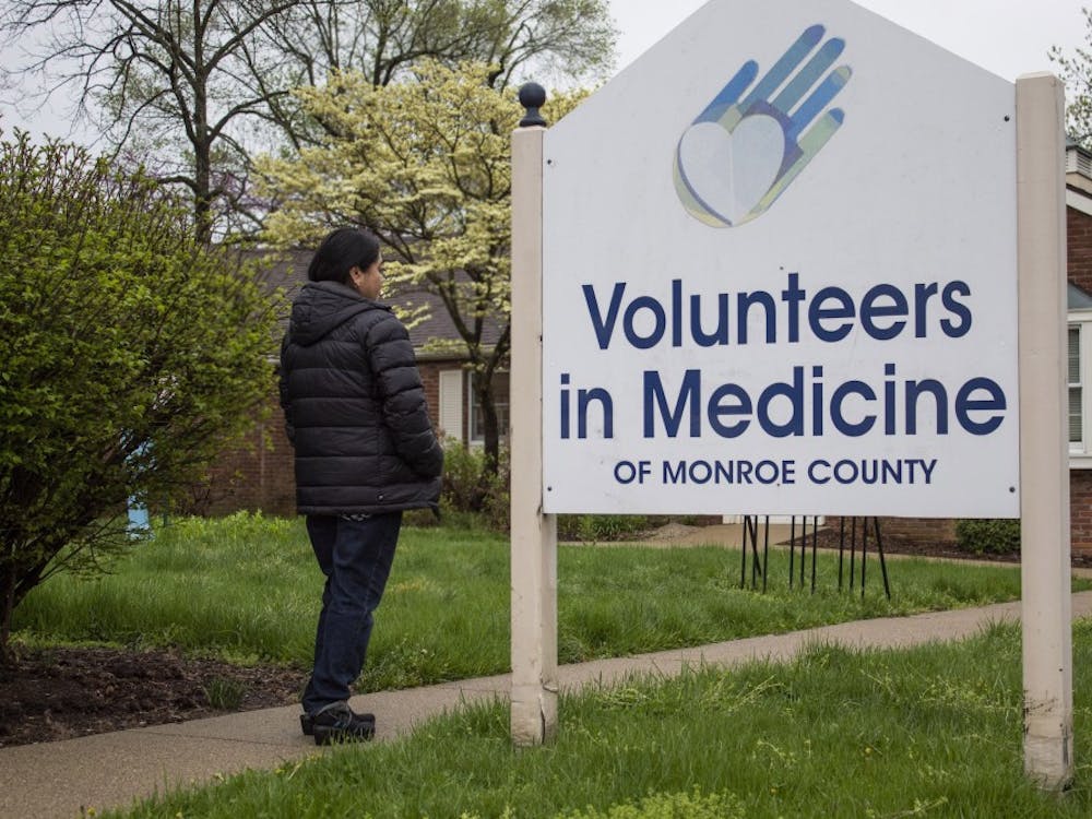 Maria López walks into the Volunteers in Medicine of Monroe County Clinic on April 19. López took her son to the clinic about two years after moving to Bloomington from Mexico City, and the clinic referred him to Riley Hospital for Children at IU Health in Indianapolis where he was diagnosed with Rocky Mountain Spotted Fever.