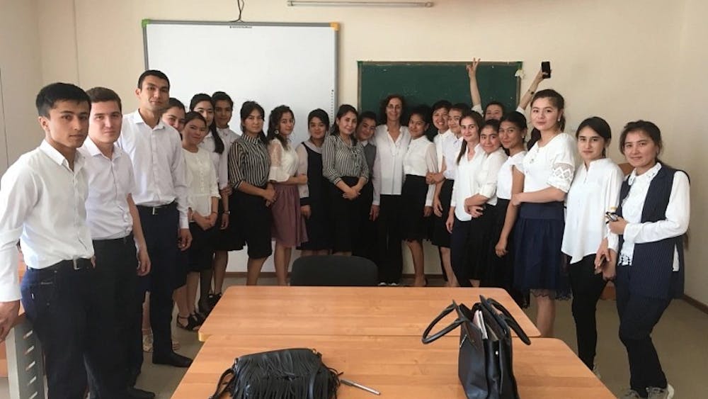 Cathy Raymond &quot;center&quot; worked with English teachers at Fergana State University in Uzbekistan under her Fulbright award. Thirteen IU Bloomington students and six faculty members were offered Fulbright awards for the 2022-23 academic school year.