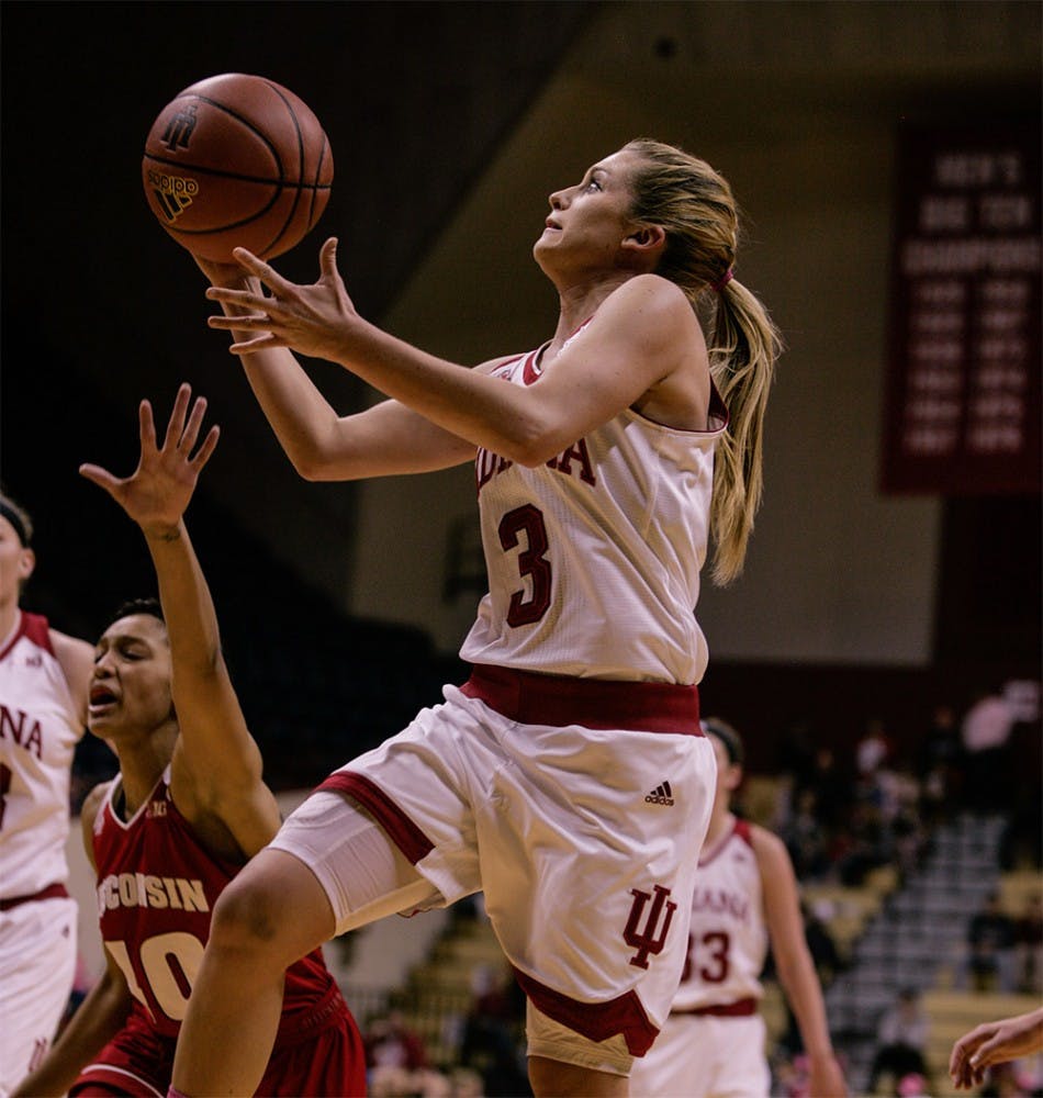Sophomore guard Tyra Buss goes up to the basket to attempt a layup against Wisconsin. Buss scored 24 points against the Badgers, leading the Hoosiers to a 67-57 victory Sunday at Assembly Hall. 