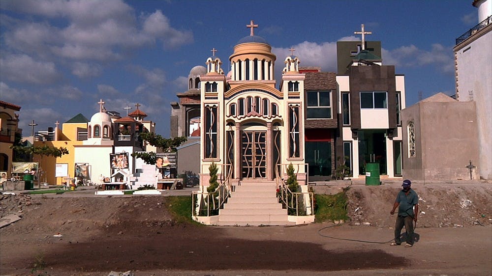 In this movie still from "El Velador (The Night Watchman)", Martin watches over cemeteries in Culiacan, Mexico for durg lords. The filmmaker, Natalia Almada will speak Tuesday at the IU Cinema  at 3 p.m.