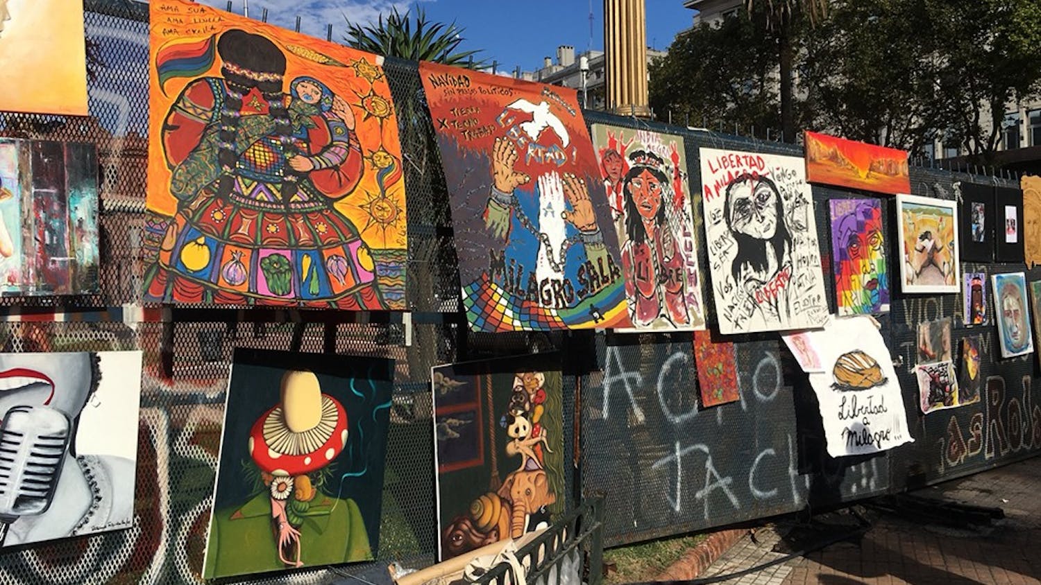 Protestors' works are attached to fences in La Plaza de Mayo during an anti-government demonstration on International Women's Day. The government under President Mauricio Macri opposes the legalization of abortion and stricter laws against femicide. 