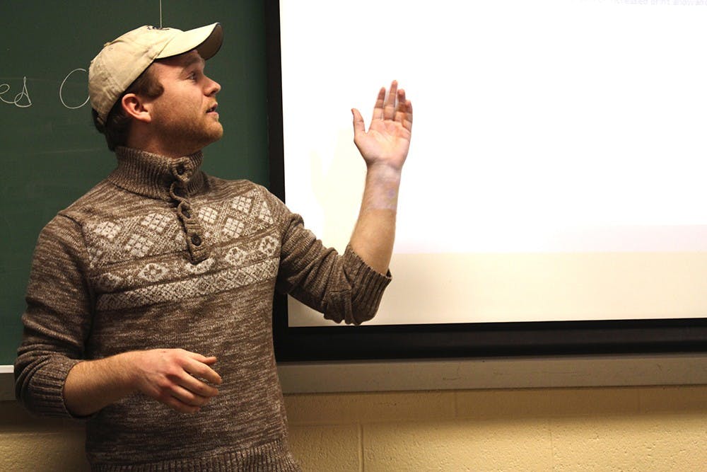 Michael French addresses issues on recycling and printing paper during an IUSA council meeting on Tuesday at Hodge Hall. 