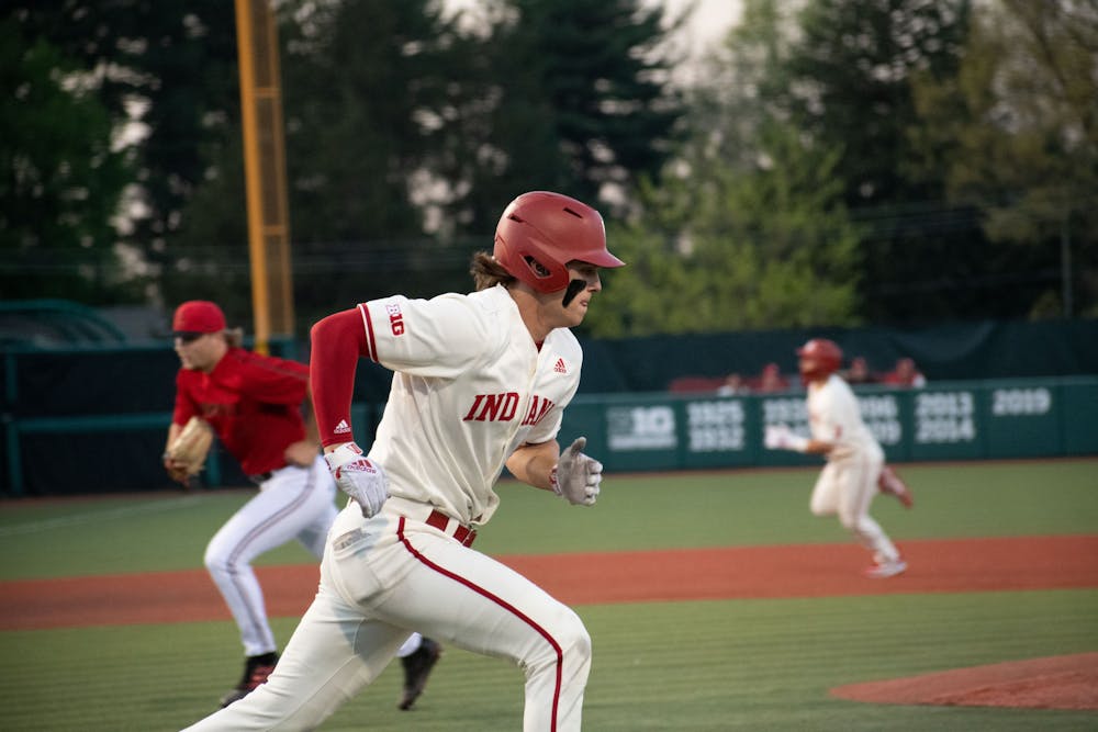 <p>Sophomore first baseman Brock Tibbitts runs to first April 18, 2023, against Louisville at Bart Kaufman Field in Bloomington. This weekend, the Hoosiers take on Ohio University in a three-game series.</p>