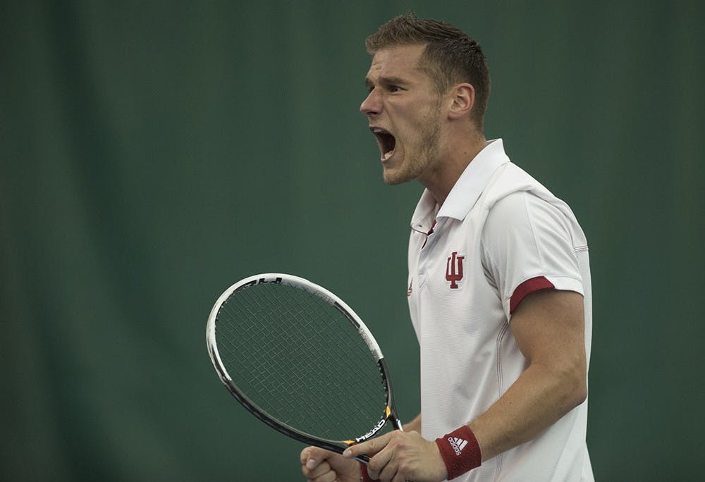 Senior Sven Lalic celebrates after winning a point against Harry Jadun of Michigan State University on Sunday at the IU Tennis Center. Lalic won the match 6-2, 6-0.