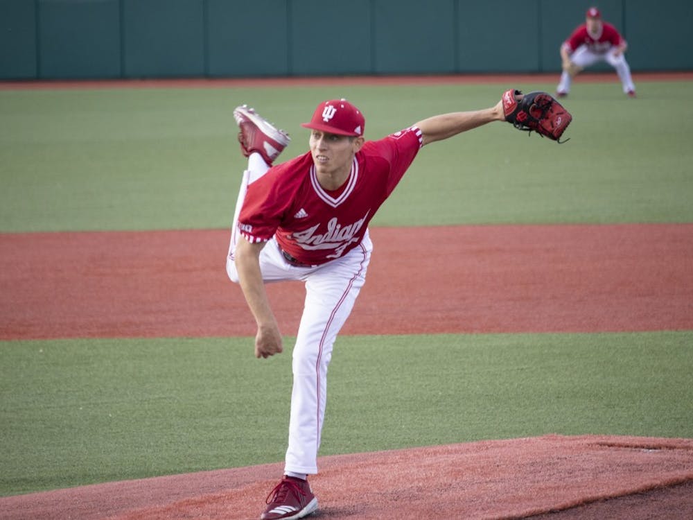 Freshman right-handed pitcher Gabe Bierman pitches the ball May 14 at Bart Kaufman Field. IU played the University of Louisville and lost, 8-7.