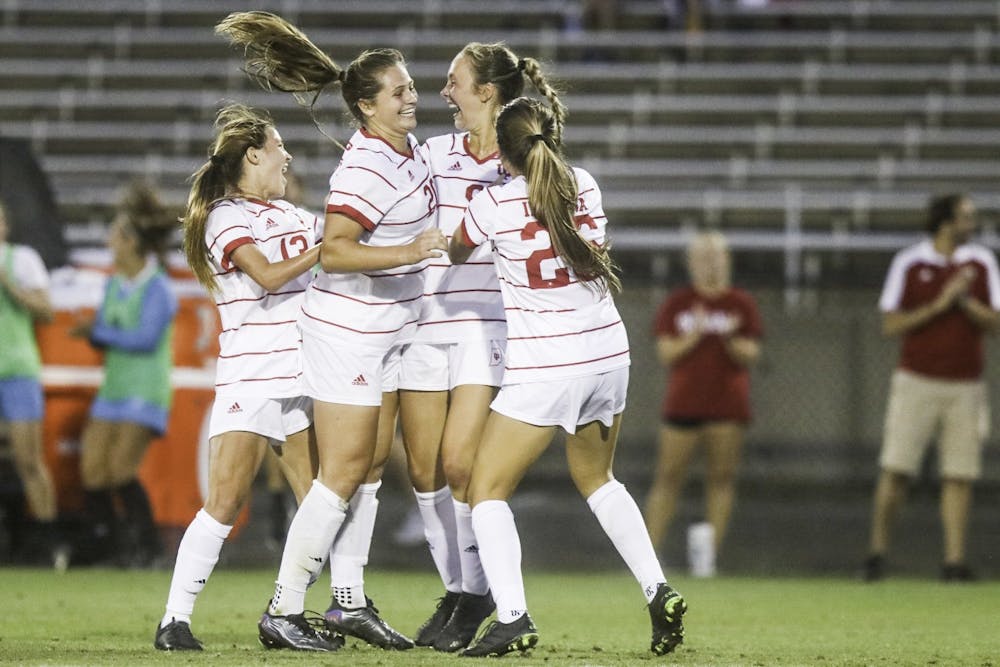 Indiana women's soccer players cheer Sept. 2, 2021, at Bill Armstrong Stadium. Indiana announced its 2023 fall schedule on May 3.