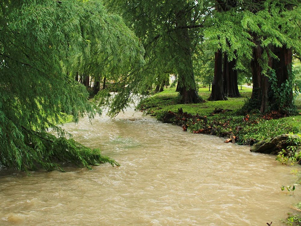 The Jordan River overflowed and flooded small sections of campus after a downpour Thursday morning.