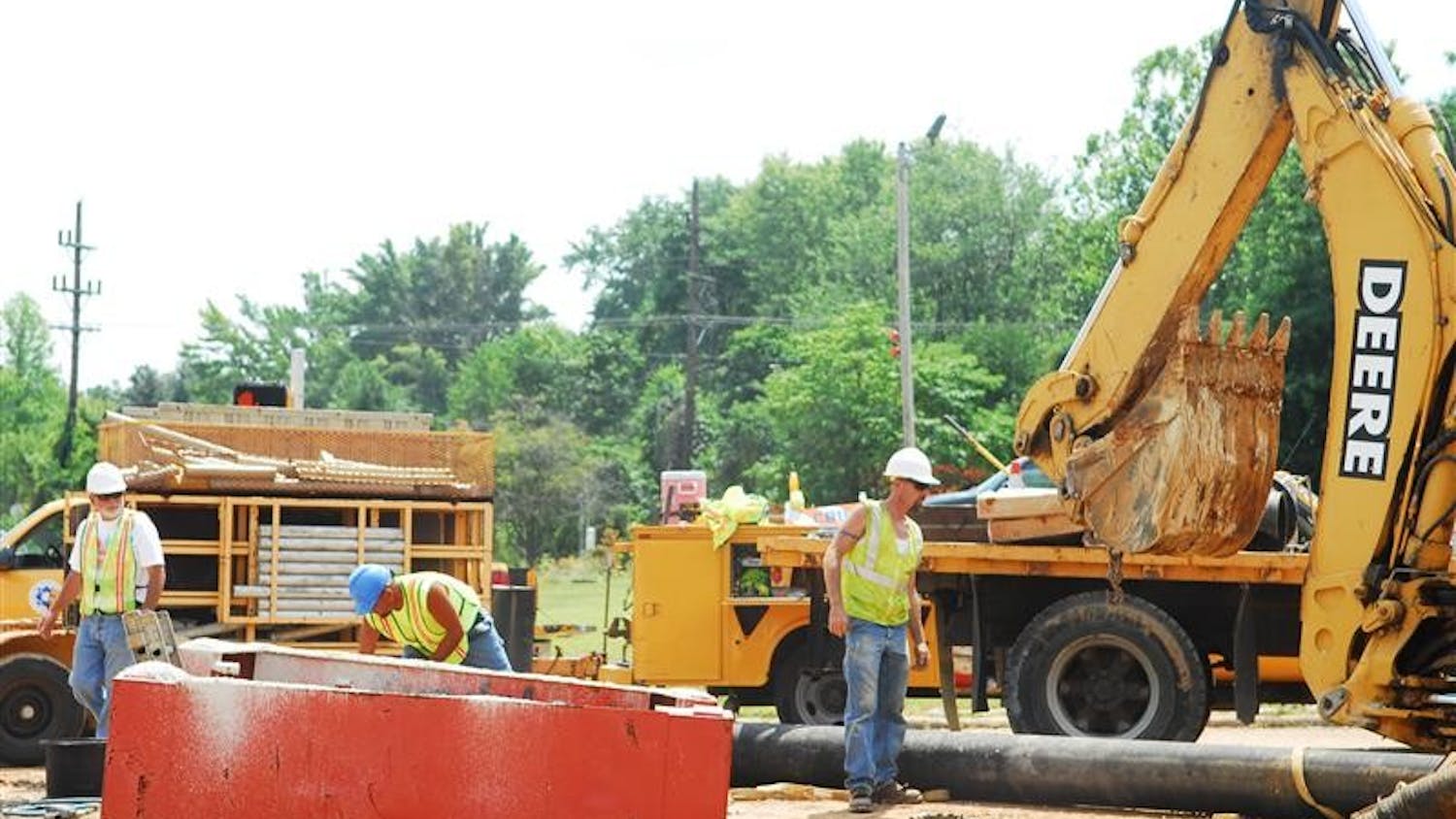 City of Bloomington utility employees work to fix the broken water main at 10th Street and the 45/46 bypass on Wednesday afternoon.