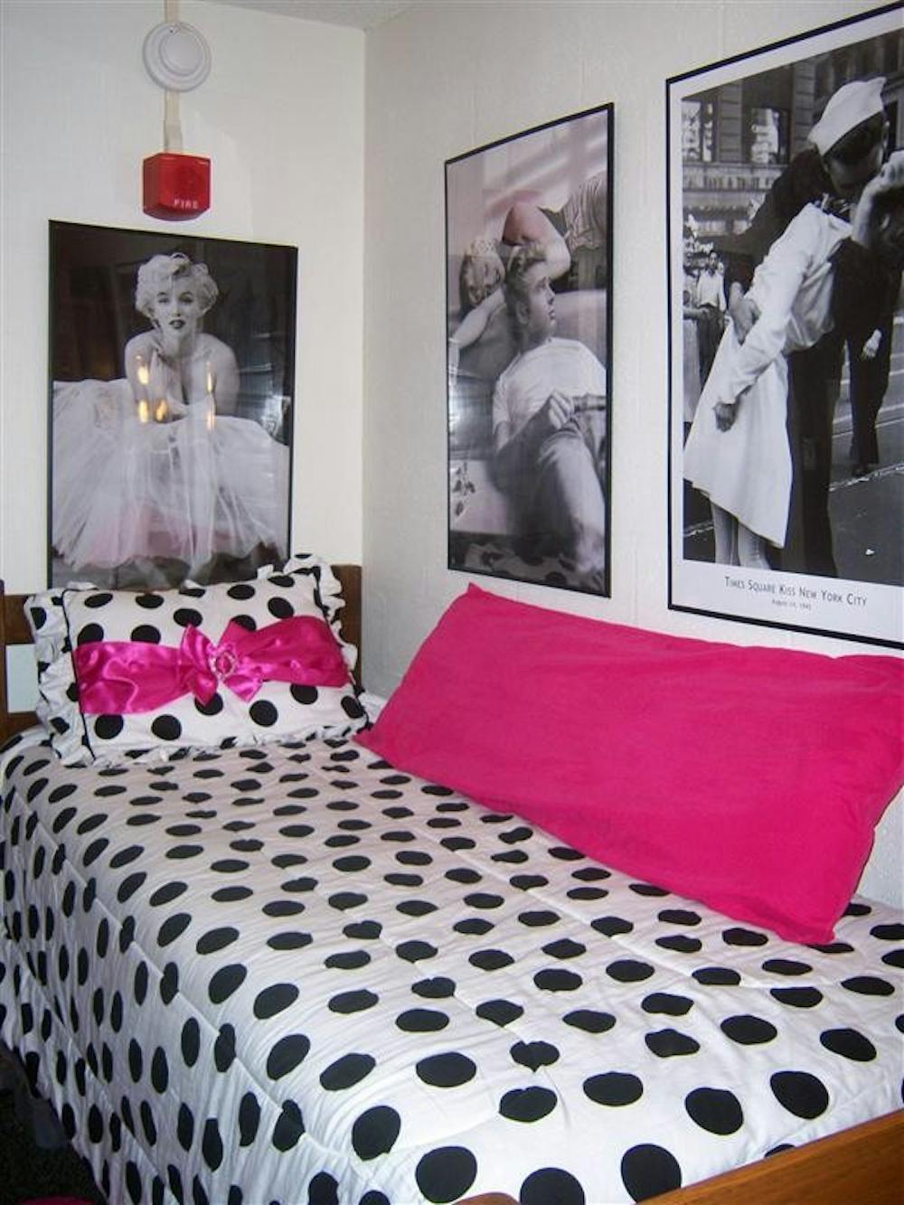 Freshman Abbey Shaffer's room proves its bold identity through the simple use of black and white yet having a bright pink contrast.