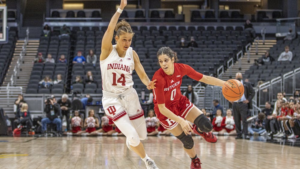 Graduate guard Ali Patberg defends a driving Rutgers player on March 3, 2022, at Gainbridge Fieldhouse in Indianapolis. Indiana will play Maryland on Friday in Indianapolis. 