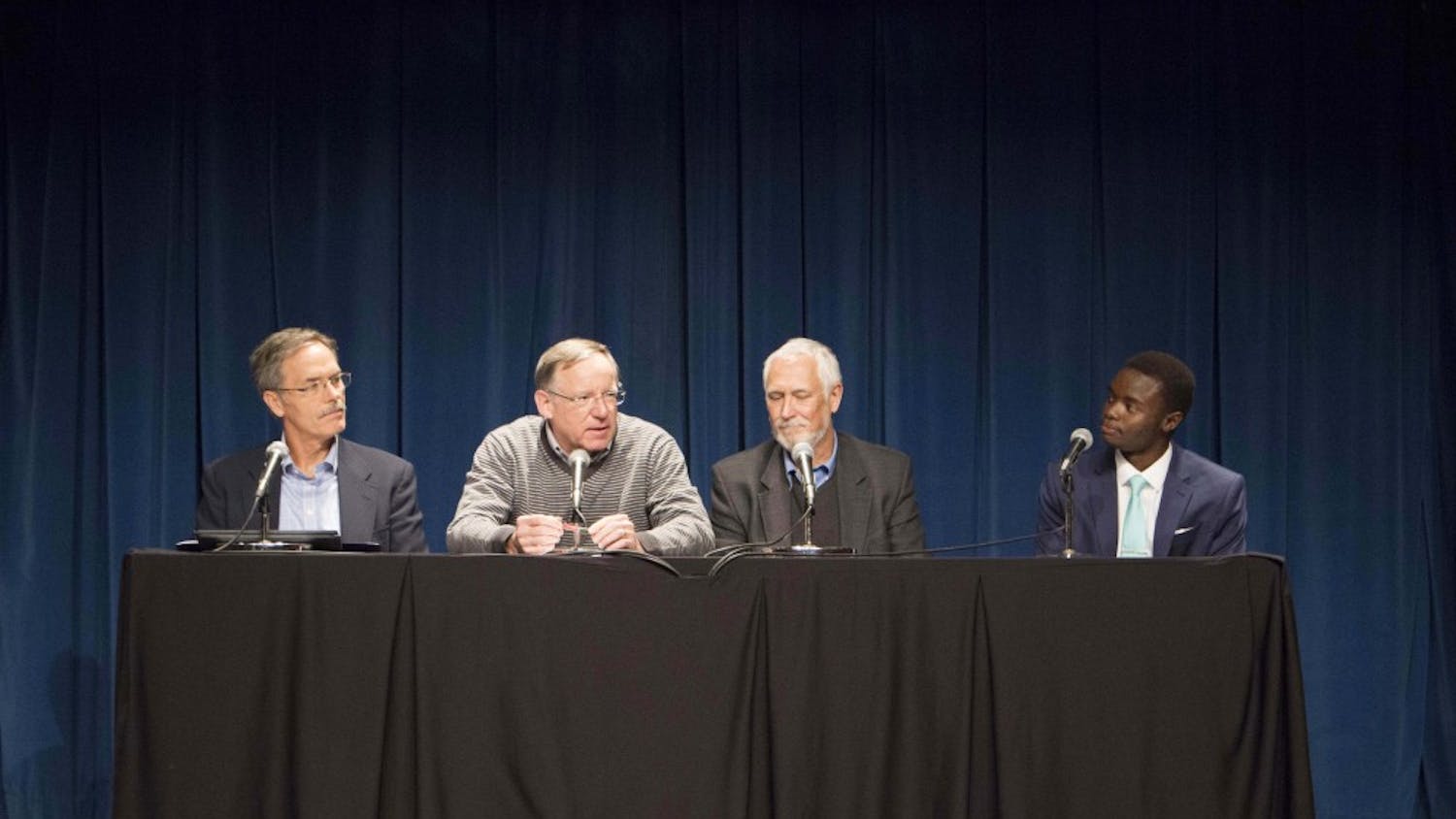 Panel members met to discuss climate change on Thursday evening in the Whittenberger Auditorium. Jeffrey White, second from the left and a professor and researcher of climate change, was the first to speak.&nbsp;