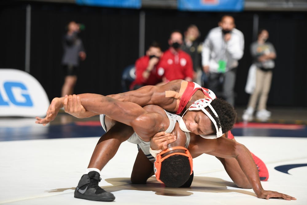 <p>Then-sophomore DJ Washington wrestles with Illinois sophomore DJ Shannon at the Big Ten Wrestling Championships on March 6, 2021, in State College, Pennsylvania. Washington went 0-2 while graduate student Brock Hudkins went 1-1 at the 2022 NCAA Championships in Detroit, Michigan.</p>