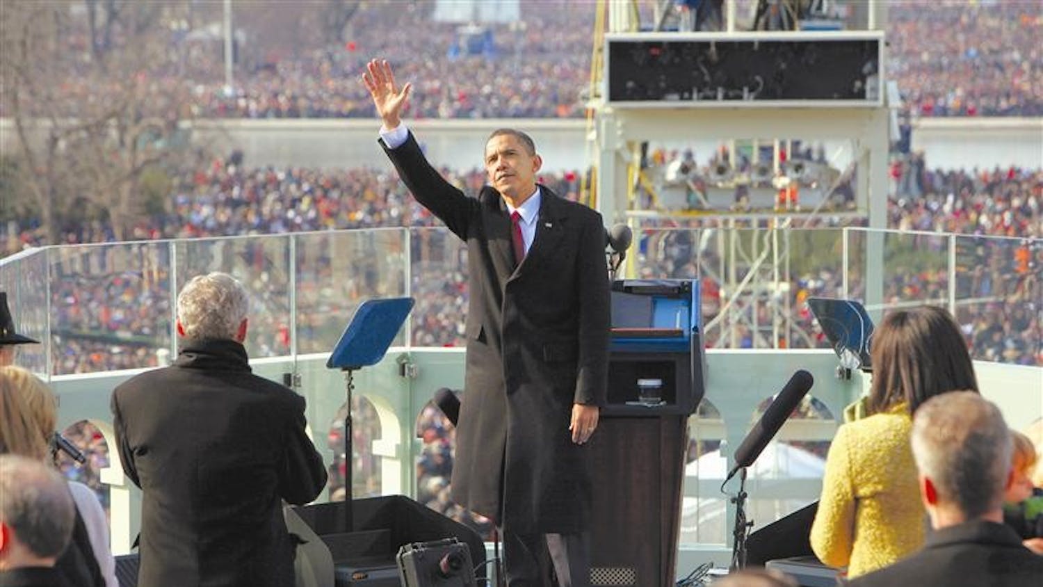 President Barack Obama waves to the crowd just after being sworn in as the 44th president at the U.S. Capitol on Tuesday in Washington.