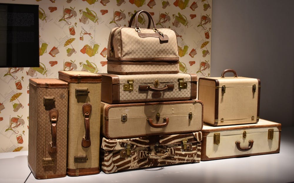 Suitcases designed by Gucci during the 20th century are highlighted in one section of the Gucci Museo in Florence.