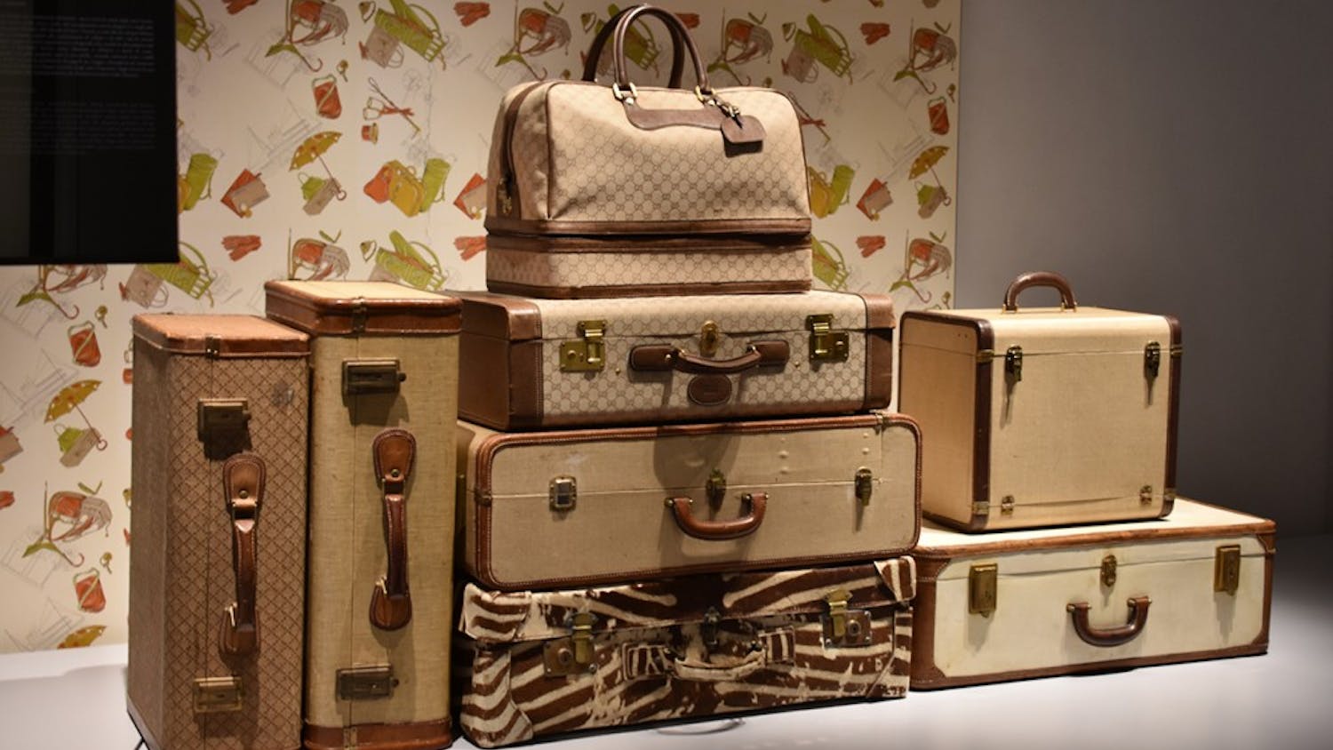 Suitcases designed by Gucci during the 20th century are highlighted in one section of the Gucci Museo in Florence.