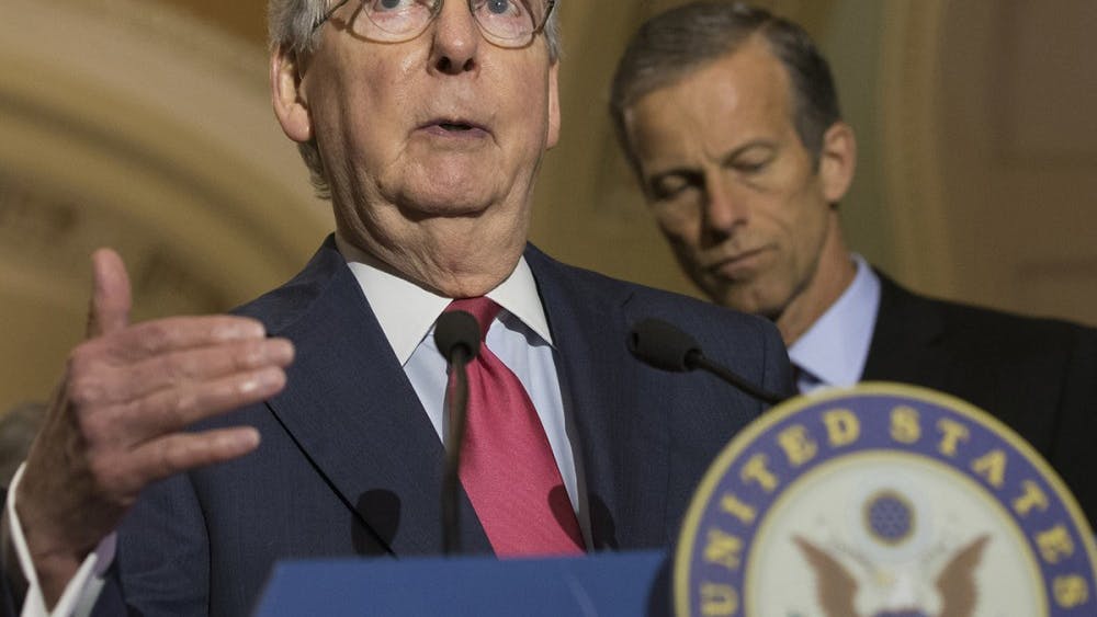 Senate Republican Leader Mitch McConnell (R-KY) defends President Trump's sharing of classified intelligence with Russian officials during a press conference on Capitol Hill on May 16, 2017 in Washington, D.C. McConnell has joined other Republicans backing proposed legislation to bolster the background-check system intended to prevent criminals from buying guns, said Sen. Chris Murphy, a Democratic sponsor of the bill. 