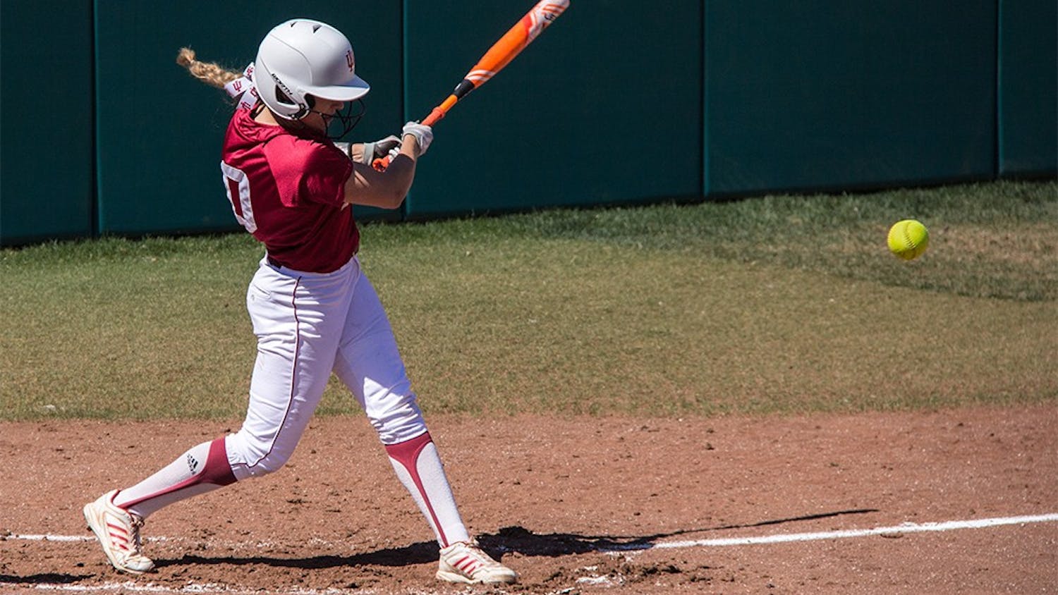 Freshman Sarah Galovich swings at a pitch on Saturday in a 9-3 win against University of Iowa at Andy Mohr Field.