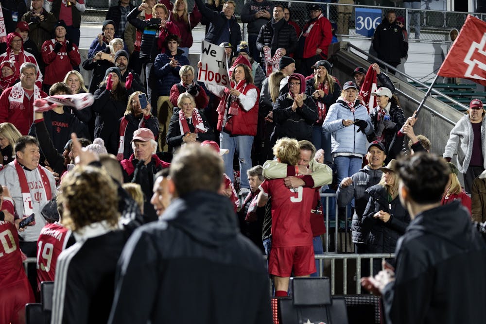 <p>Sophomore forward Samuel Sarver embraces a fan after Indiana&#x27;s win against Pittsburgh December 9, 2022, at WakeMed Soccer Park in Cary, North Carolina. The Hoosiers will play in the National Championship game Monday against Syracuse.</p>