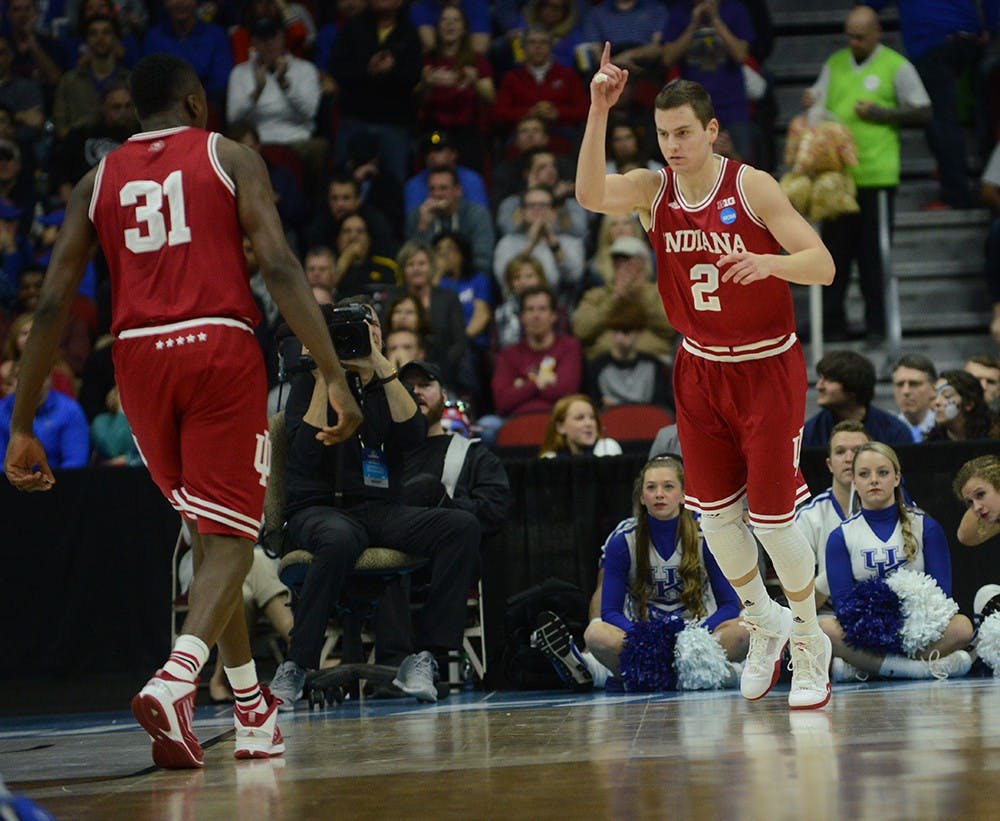 Redshirt senior Nick Zeisloft reacts after making a three pointer during the NCAA Tournament game against Kentucky on Saturday at the Wells Fargo Arena in Des Moines, Iowa. The Hoosiers won 73-67 to advance to the Sweet 16.