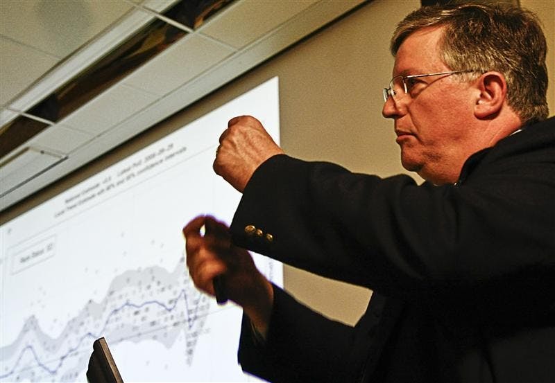 Charles H. Franklin speaks Tuesday evening at Woodburn Hall. Franklin spoke about media and the use of polls, and teaches statistical analysis of polls at the University of Wisconson.