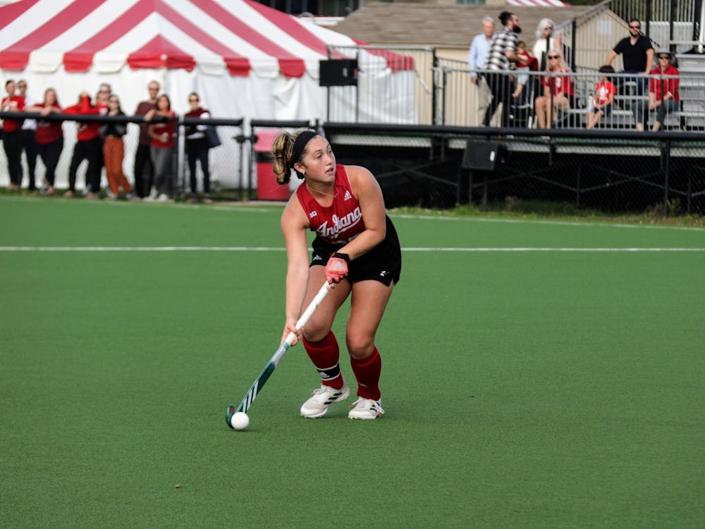 Senior midfielder Jes McGivern looks down the field during a match against Michigan State University on Oct. 15, 2021, at the IU Field Hockey Complex. Indiana fell to No. 2 University of Michigan 5-3 Sunday.