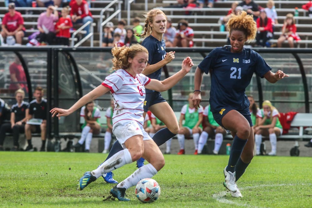 <p>Junior midfielder Avery Lockwood goes to kick the ball Oct. 3, 2021, in Bill Armstrong Stadium against Michigan. Indiana and Michigan drew 0-0 after the game was called due to bad weather.</p>