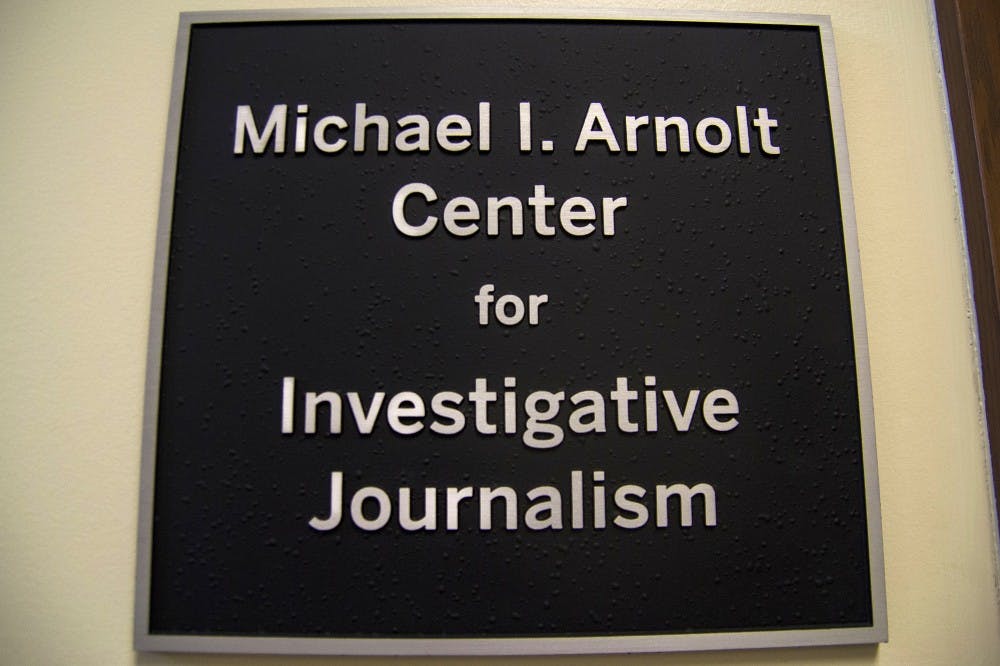 <p>The sign for the Arnolt Center for Investigative Journalism hangs a wall Sept. 5 in Franklin Hall.</p>