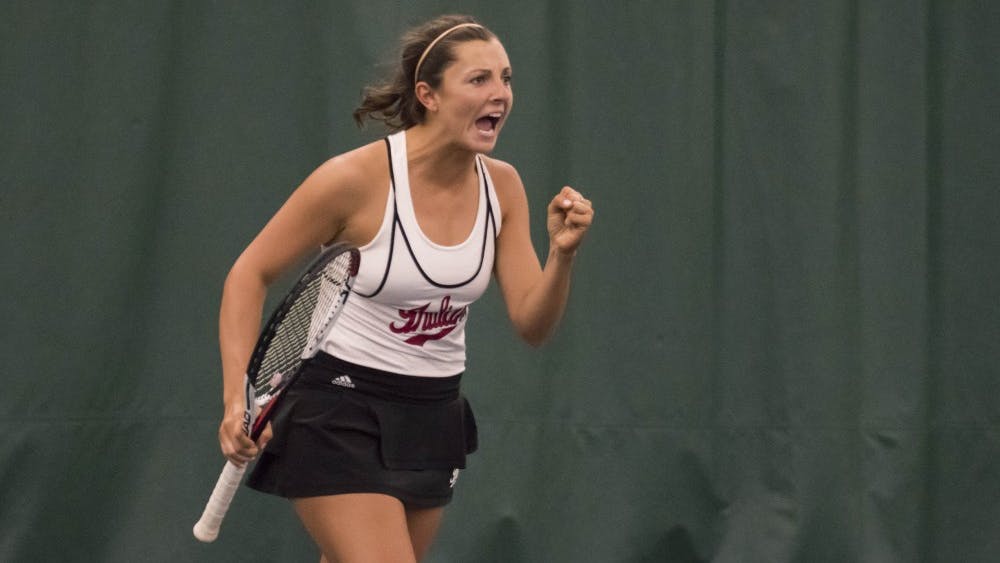 Then-freshman, now-sophomore, Michelle McKamey celebrates winning a point during a doubles match last season. IU played Michigan State on Sunday and won, 5-2. 