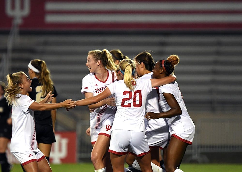 IU celebrates after junior forward Maya Piper scores a goal in the first half against Purdue Saturday evening at Bill Armstrong Stadium. IU tied Purdue, 1-1, to move to 5-4-2 on the season.