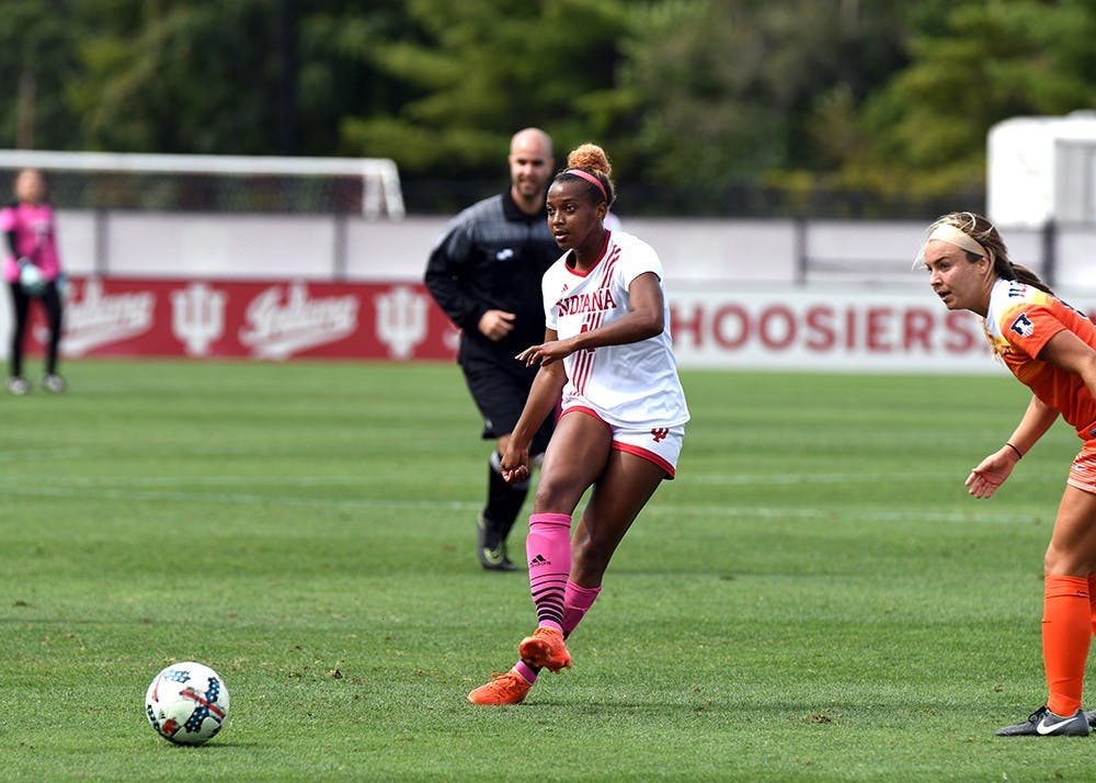 Redshirt junior forward Mykayla Brown passes the ball against Illinois on Oct. 1 at Bill Armstrong Stadium. IU will not make the postseason after reaching the Big Ten Tournament last season.&nbsp;