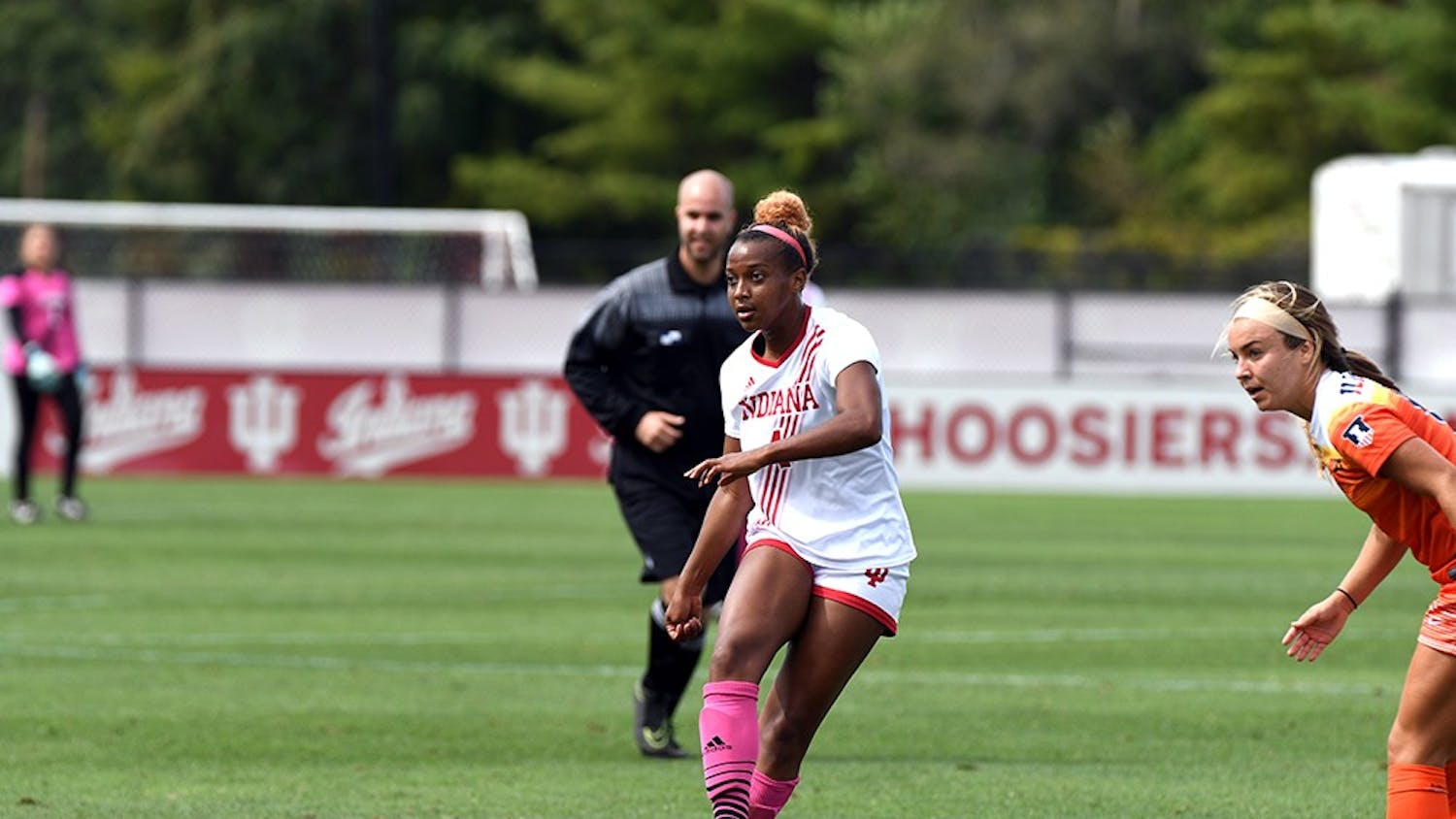 Redshirt junior forward Mykayla Brown passes the ball against Illinois on Oct. 1 at Bill Armstrong Stadium. IU will not make the postseason after reaching the Big Ten Tournament last season.&nbsp;