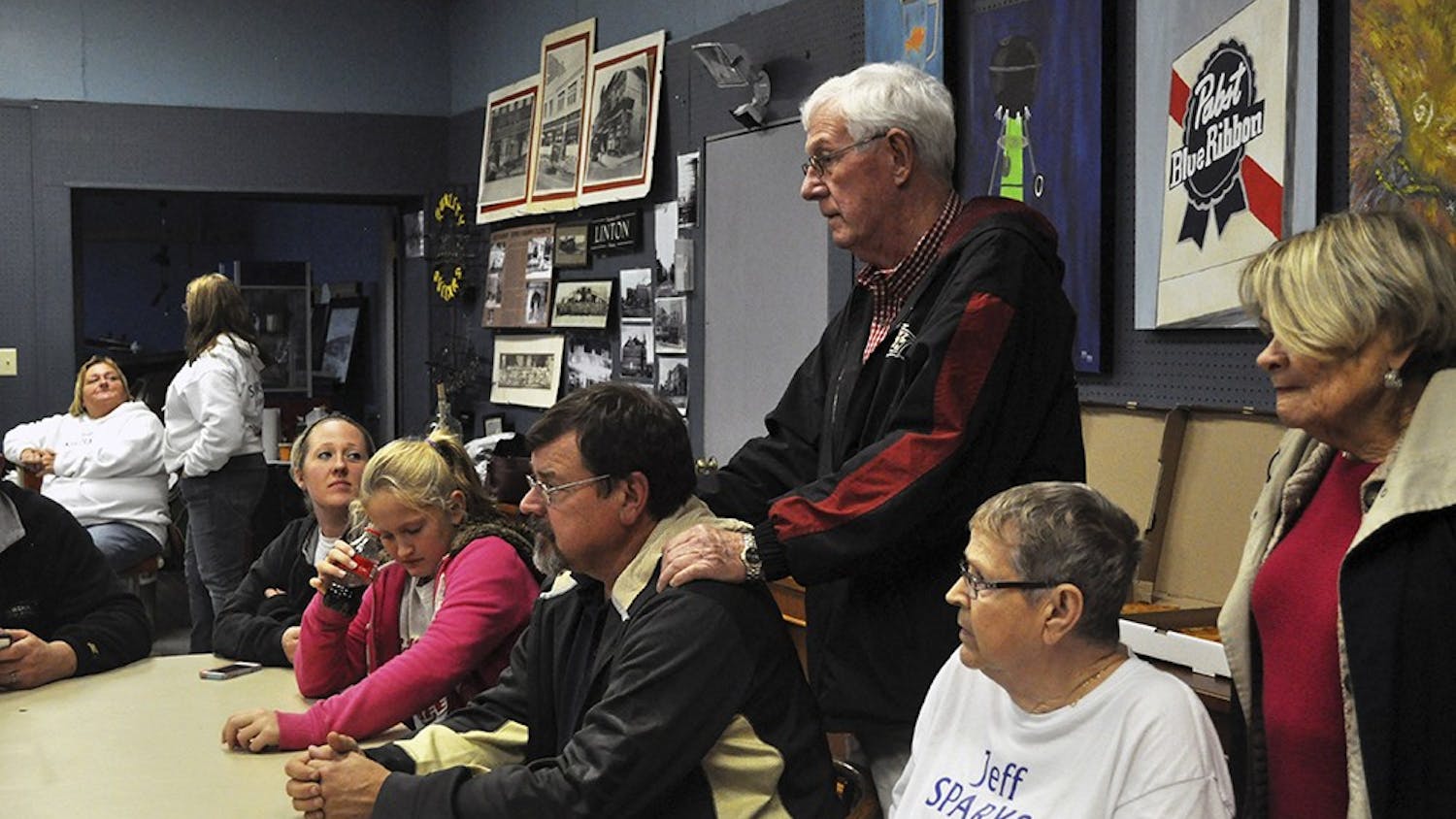 Linton Mayor John Wilkes comforts Sparks in the final moments of the campaign. Twenty-six miuntes later, the race for the next House Representative for Distrcit 62 was called for Sparks' opponent, Matt Ubelhor. The final vote tally was 41 percent Sparks and 55 percent Ublehor. The margin of defeat was greater this campaign than Sparks' previous challenge to Ubelhor two years earlier in the 2012 election.