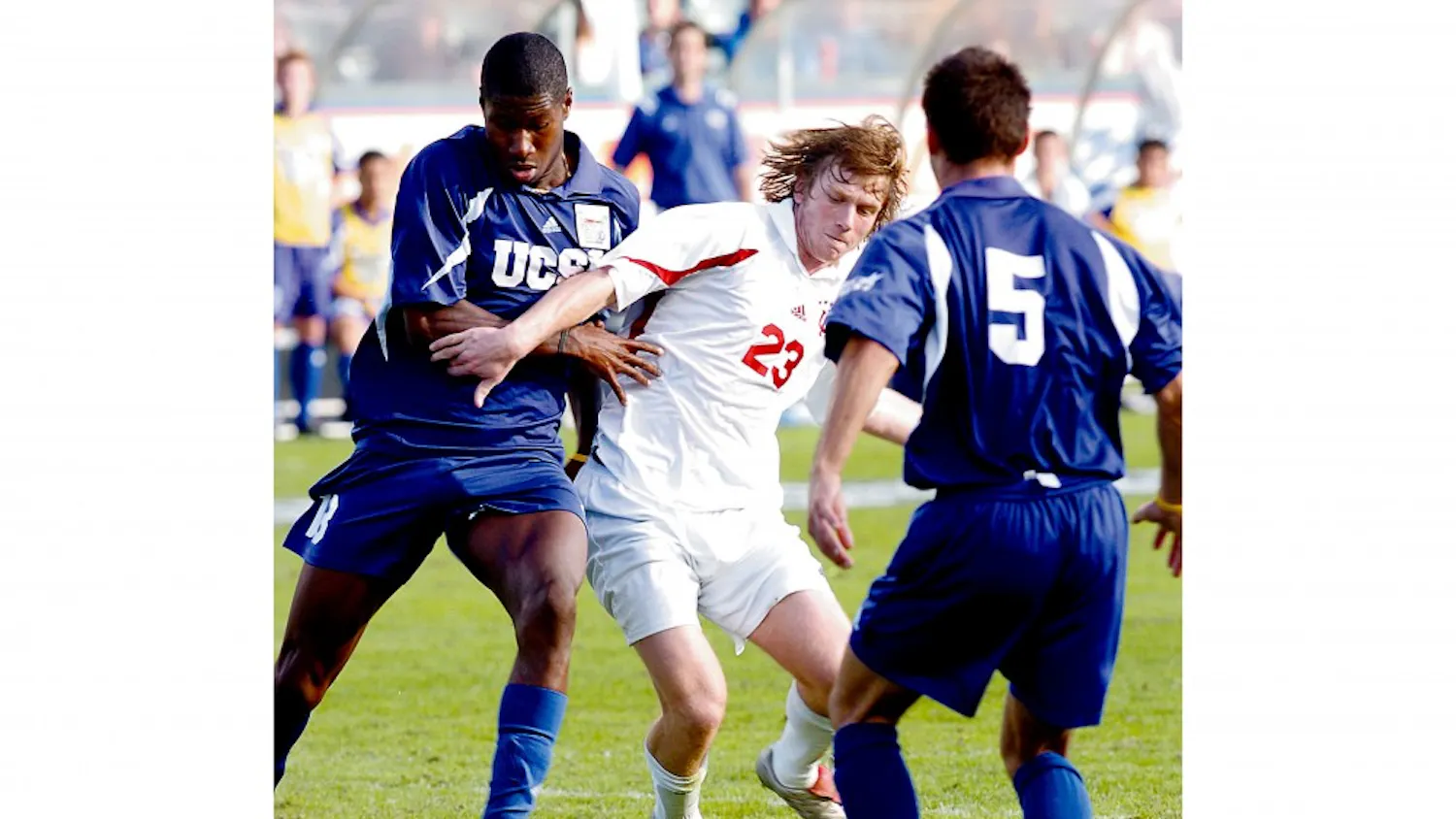 IU sophomore Jacob Peterson shields the ball from two University of California at Santa Barbara players during the 2004 NCAA College Cup Final at the StubHub Center, then known as the Home Depot Center, in Carson, California. The Hoosiers defeated UCSB in penalty kicks to win the program's seventh national title.