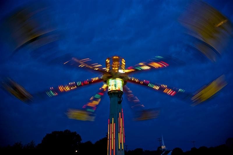 Riders go around on the Downdraft on Saturday during the 52 annual Fun Frolic at Memorial Stadium.