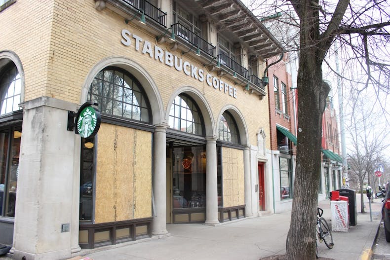 The Starbucks on Indiana Avenue has boarded up windows after rocks were thrown through the window on Sunday evening. Since surveillance cameras were not working at the time, the Bloomington Police Department has no leads.&nbsp;