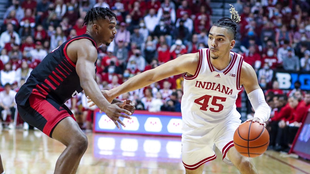 Redshirt senior guard Parker Stewart dribbles the ball Nov. 21, 2021, at Simon Skjodt Assembly Hall. Stewart scored 16 points in Indiana&#x27;s 76-44 win over the University of Louisiana at Lafayette on Sunday.