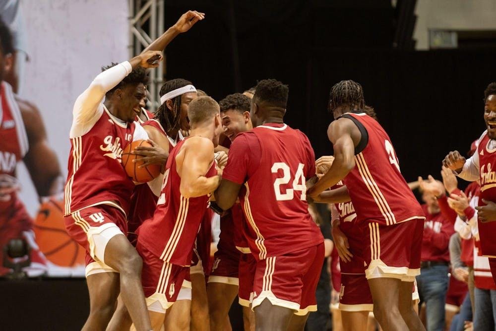 Indiana men's basketball team members celebrate with senior guard Anthony Leal during Hoosier Hysteria on Oct. 20, 2023, in Simon Skjodt Assembly Hall. Indiana men's and women's basketball will hold the 2024 iteration of Hoosier Hysteria on Oct. 18.