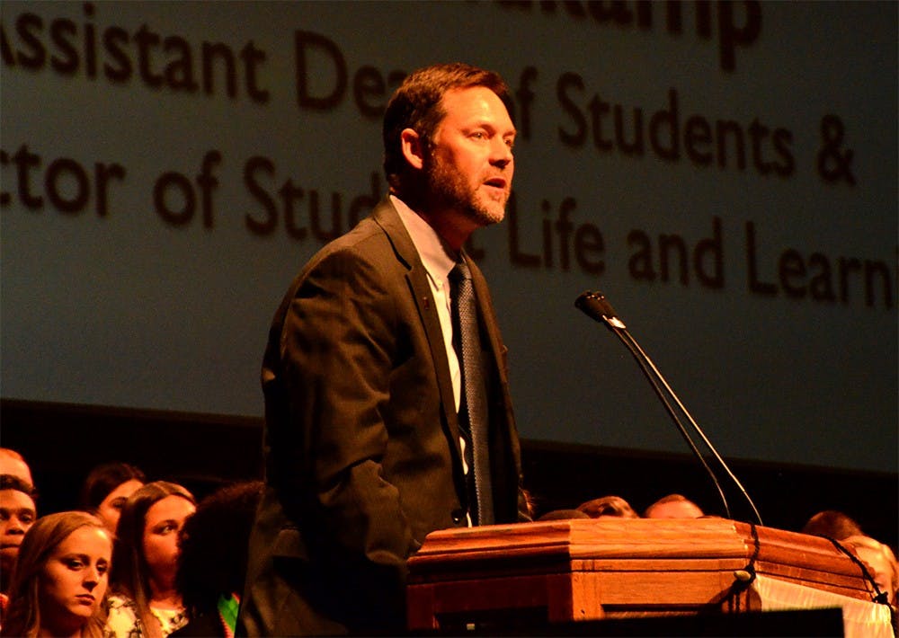 Steve Veldkamp, assistant dean of Students and the Director of Student Life and Learning, announces a recipient of the GAAP Overall Chapter of Excellence on Sunday at IU Auditorium. Various greek organizations attended and celebrated their achievements. 