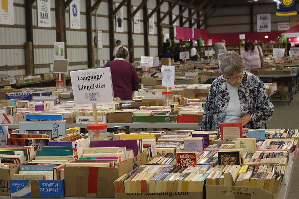 Shoppers browse through the selection at the 32nd annual Bloomington Community Book Fair. Over 100,000 items were donated for the event, which took place at the Monroe County Fairgrounds Thursday through Tuesday. 