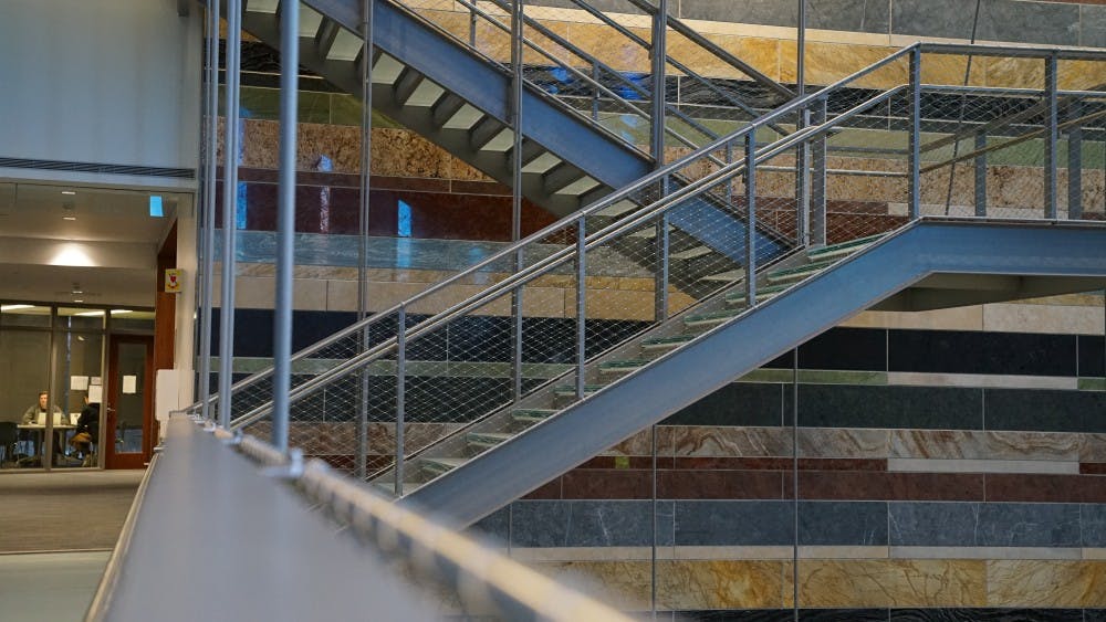 Located in the atrium behind the three-story staircase in the Global and International Studies Building is a stone wall. The Stones of the World on the wall face east and include stones from 10 different countries and six continents.