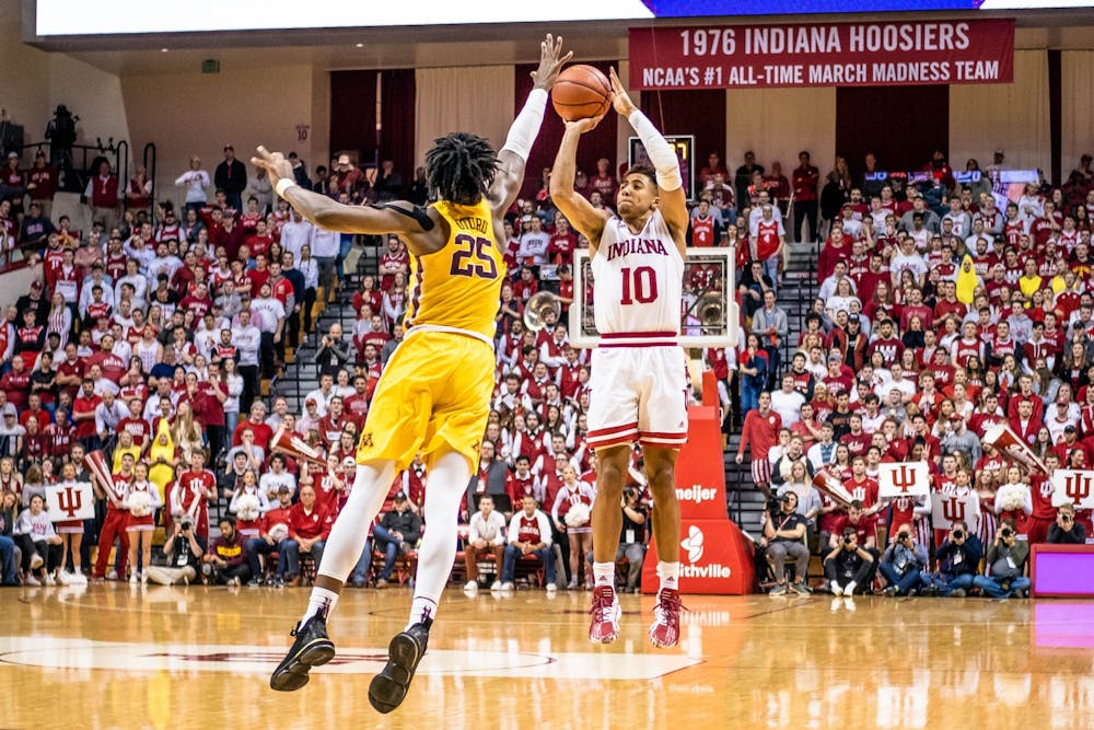 <p>Sophomore guard Rob Phinisee attempts to shoot a 3-pointer March 4 in Simon Skjodt Assembly Hall. Phinisee scored 11 of IU&#x27;s 72 points in the game against Minnesota.</p>