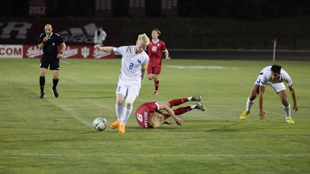 Sophomore forward Samuel Sarver takes a fall after a collision with a University of Kentucky player Oct. 22, 2022, at Bill Armstrong Stadium. Sarver made one shot during the matchup.