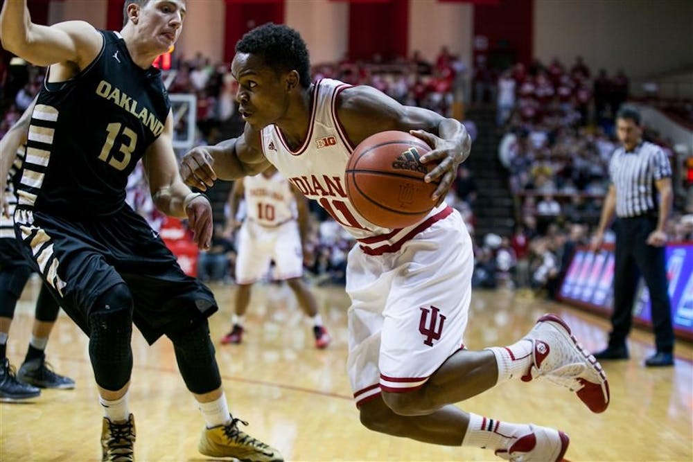 Point guard Kevin "Yogi" Ferrell drives around a defender Tuesday at Assembly Hall. Ferrell scored 11 points in Indiana's 81-54 victory against Oakland. 