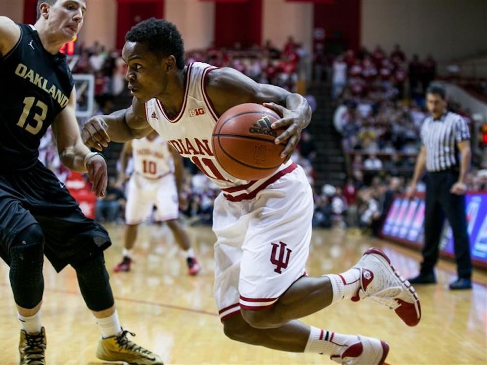 Point guard Kevin "Yogi" Ferrell drives around a defender Tuesday at Assembly Hall. Ferrell scored 11 points in Indiana's 81-54 victory against Oakland. 